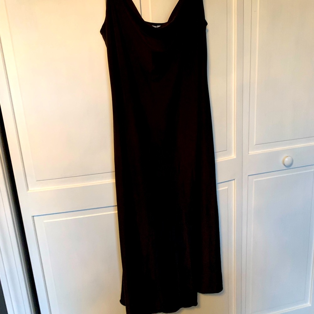 Black silky dress with spaghetti straps. Never worn.